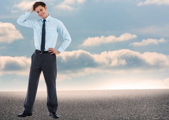 Composite image of thoughtful businessman with hand on head
