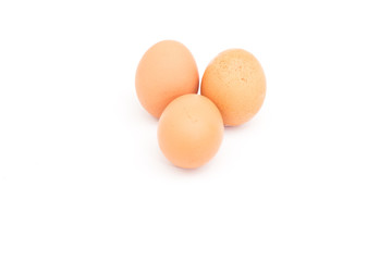 Three  eggs are isolated on a white background