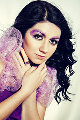 Naklejka premium Beautiful girl with extreme violet make-up