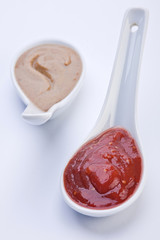 Ketchup in spoon