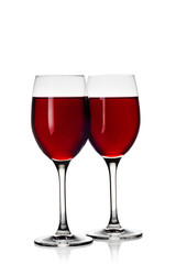 Two Wine Glasses with Red Wine on White Background
