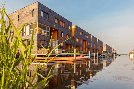 Row of Dutch modern canal houses in Almere