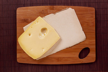 Cutting board and cheese