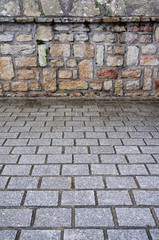 Hintergrund Granitpflaster und Natursteinmauerwerk