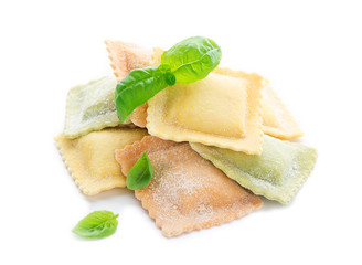 raw ravioli and basil