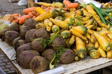 Root vegetables for sale at farmers market.