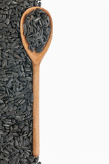 wooden spoon with sunflower seeds