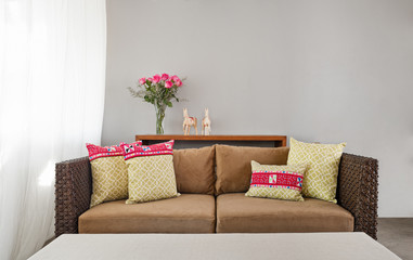 Beige brown sofa in interior setting