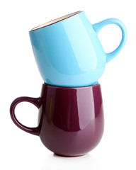 Colorful cups isolated on white