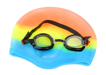 Swim cap and goggles isolated on white