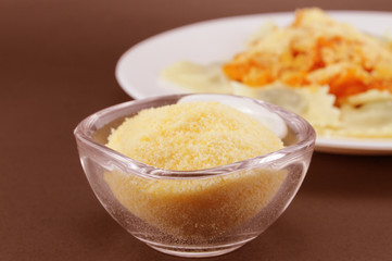 Grated cheese and ravioli
