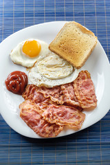 egg and bacon with toast