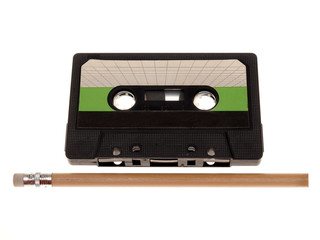 retro music audio tape with a pencil - obrazy, fototapety, plakaty