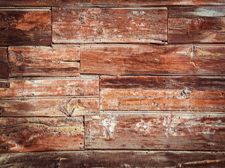 Naklejka premium Stary Drewniany tło - rocznik z czerwonymi i brown kolorami