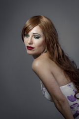 Naklejka premium Beautiful sexy woman with elegant long red shiny hair , hairstyl