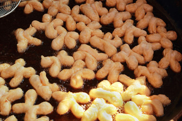 Deep-fried dough stick on the pan