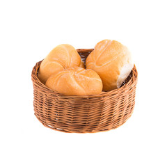 Buns in a wicker basket isolated in white background.