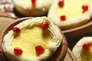 Rasagolla is a popular cheese based, syrupy sweet dish