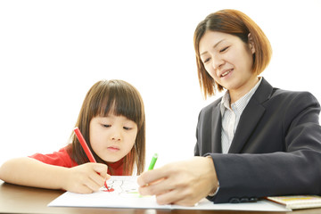 笑顔の女の子と女性教師