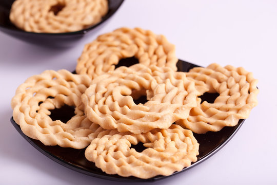 Murukku is a savoury snack popular in South India.