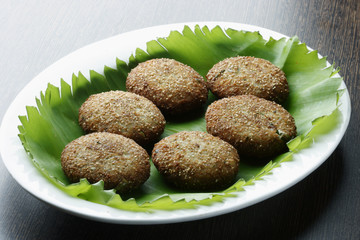 Posto narkel Bora – A Bengali dish