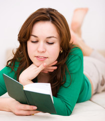 Woman is reading a book