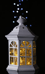 Obraz premium Decorative glowing lantern at night