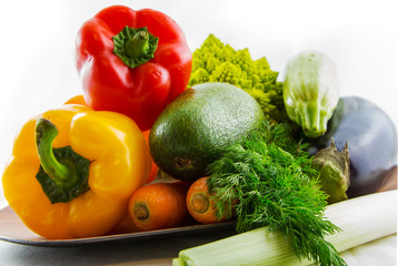 Fresh colorful vegetables set on table isolated