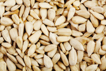 Peeled sunflower seeds background