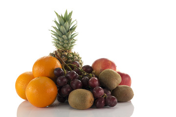 Naklejka na ściany i meble fruit as oranges pineapple grapes and kiwi