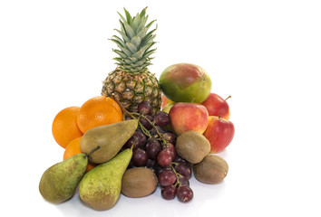 fruit as oranges pineapple grapes and kiwi