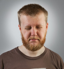 Obraz premium Man closed his eyes and relaxed