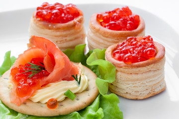 sandwich and canapes with caviar and fish