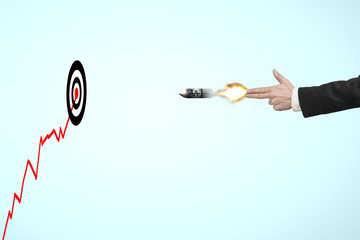 Hand shooting gesture with money symbol on bullet and target