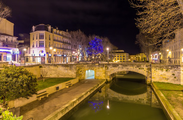 Fototapeta na wymiar Night view of Canal de la Robine in Narbonne, France