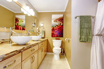 Fototapeta na wymiar Modern bathroom with white vessel sinks