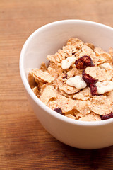 Muesli granola with raisin in bowl 