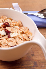 Muesli granola with raisin in bowl 