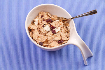 Muesli granola with raisin in bowl 
