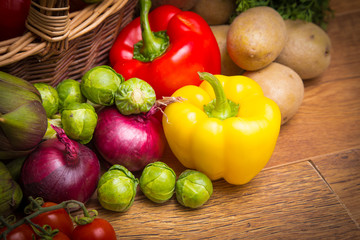 colored vegetables in wicker basket