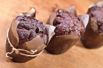 Homemade blueberry muffins in paper cupcake holder 