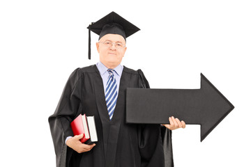Male college professor holding big black arrow pointing right