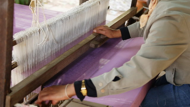 detail of traditional thai loom at work