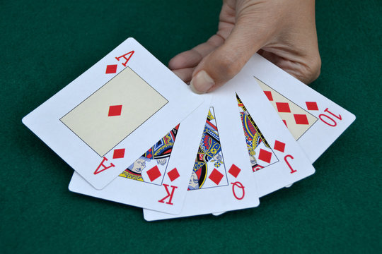 Girl showing poker cards