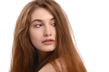 Fototapeta premium Young woman looking back over her shoulder.Girl looking behind.