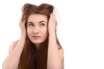 Fototapeta premium Thinking,contemplating,day dreaming.Young funny woman looking up