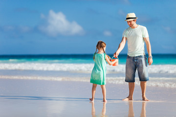 Father and daughter on a beach