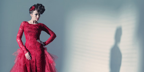 Fantastic woman wearing fashionbable red dress