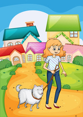 A woman strolling with her dog