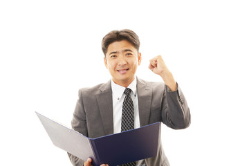 ガッツポーズのビジネスマン